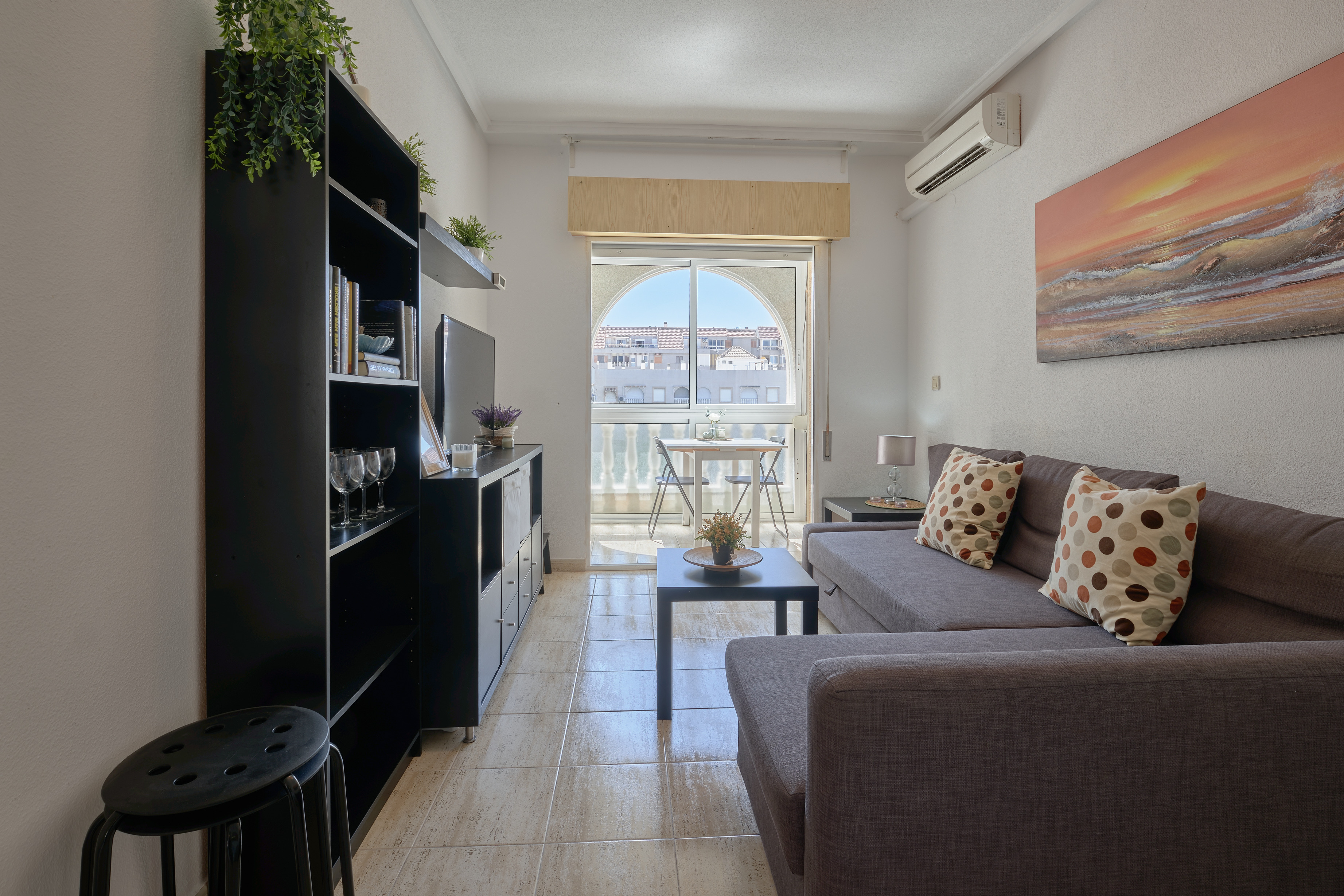 Reina Rosa living room with balcony view